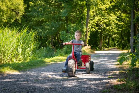boy-riding-tricycle-with-wagon
